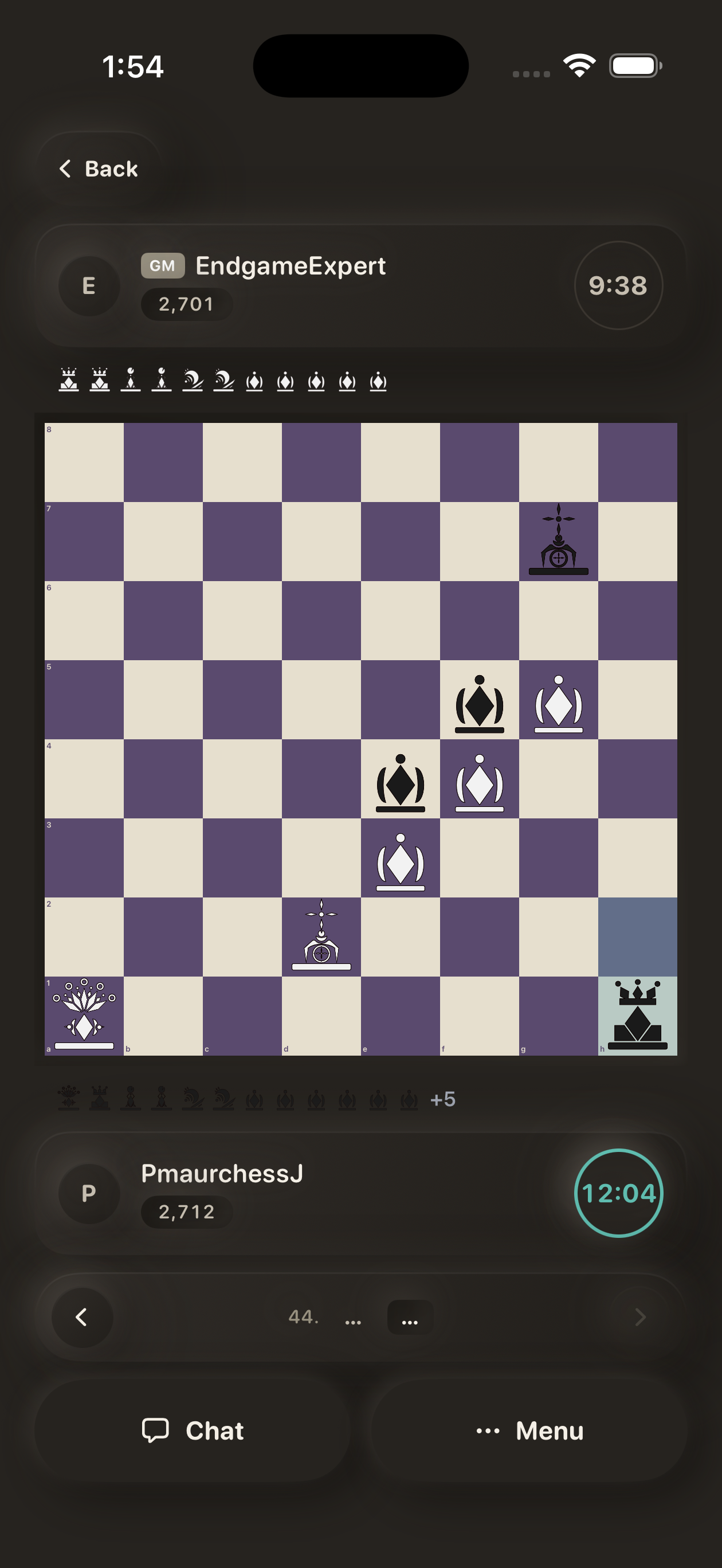 An endgame in Maurchess, with captured pieces listed above and below the board and both clocks visible.